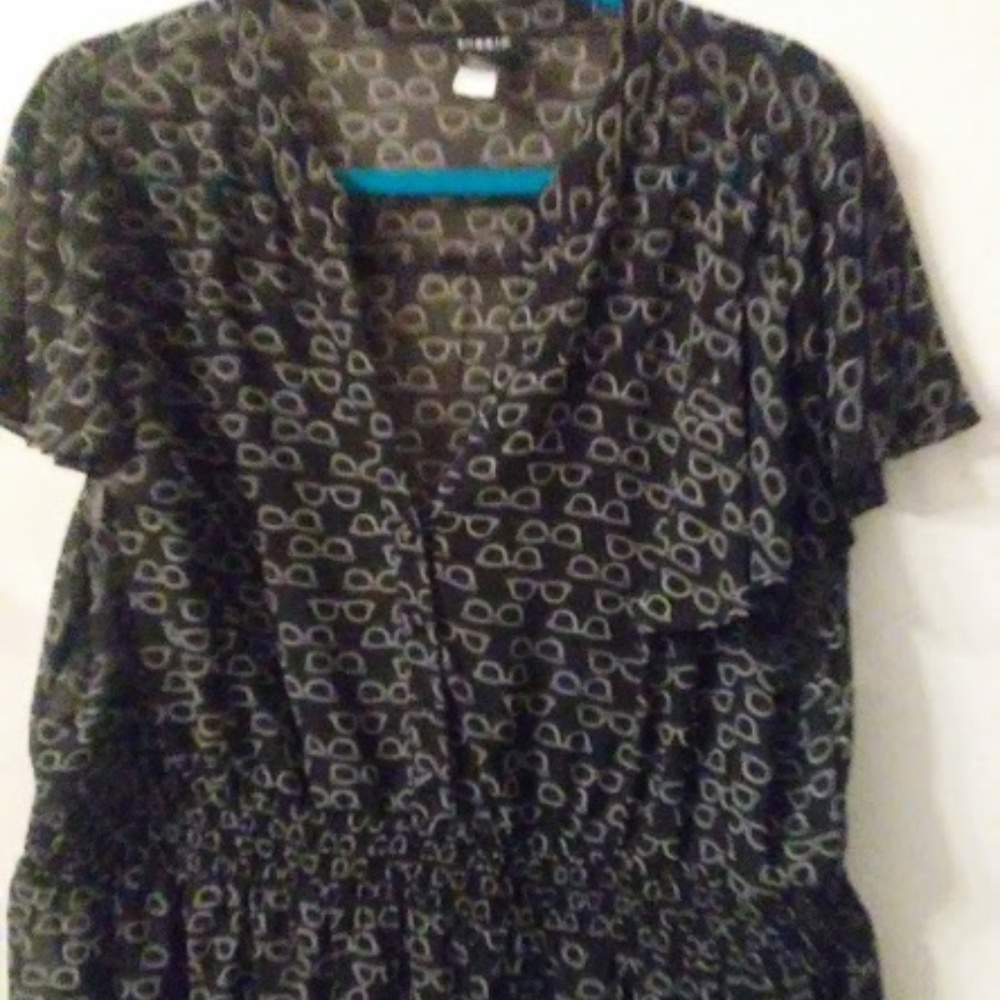 Black surplice blouse with sunglasses print